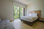 LMV48 Bedroom 1 with premium bedding and terrace